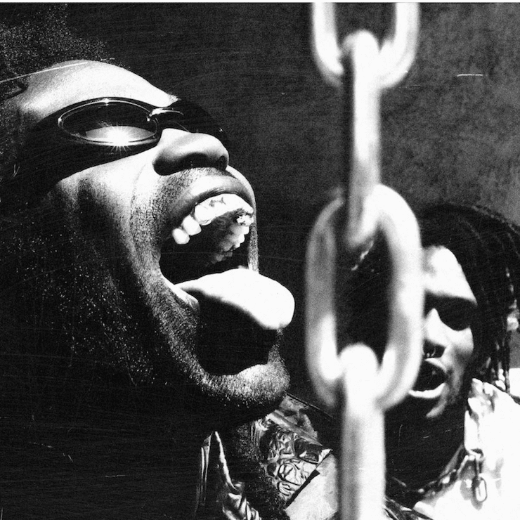 Press shot of Ho99o9 with a chain in the foreground